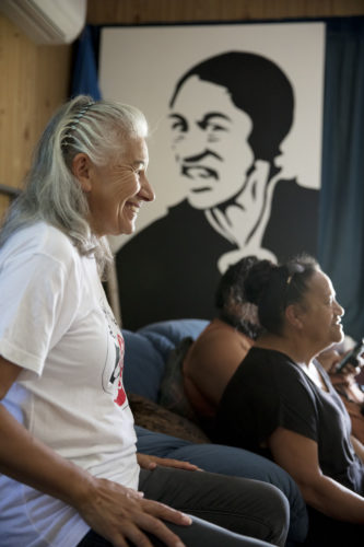 Angeline with her mum, Eva Rickard in the background. Photographer Maarten Holl, Te Papa.